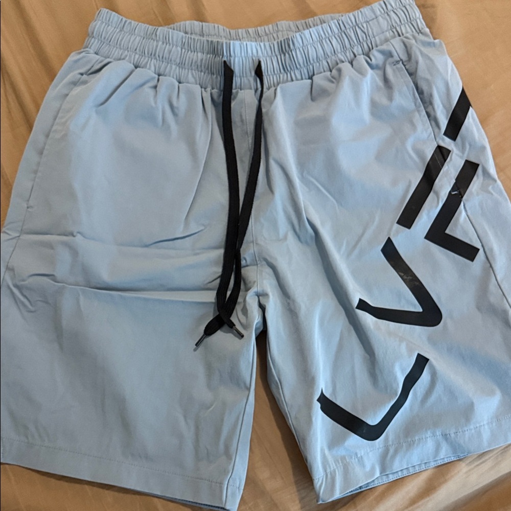 Light Blue Athletic Shorts with Black Accents